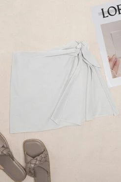 Discount 🔥 Cupshe Chelsey Tie Waist Irregular Hem Beach Skirt 👏 -Cupshe Online Shop 1 111c721e e5e5 4041 8ef3 d5a843ed6cf9